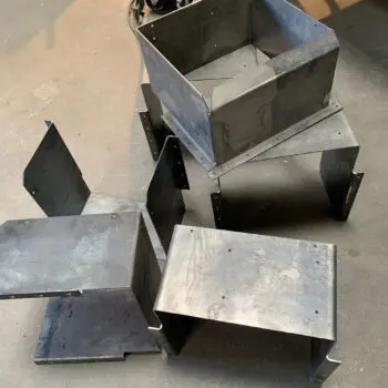 Fabricated metal components on floor