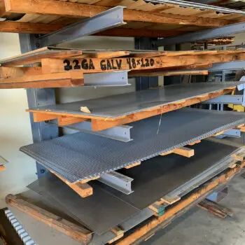 Metal sheets on wooden shelves